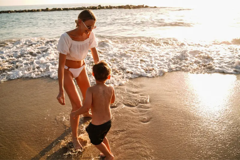 Mother And Child On A Tenerife Beach