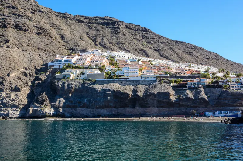 Playa de Los Guíos Guide: Black Sand, Los Gigantes Cliffs and Swimming Tips